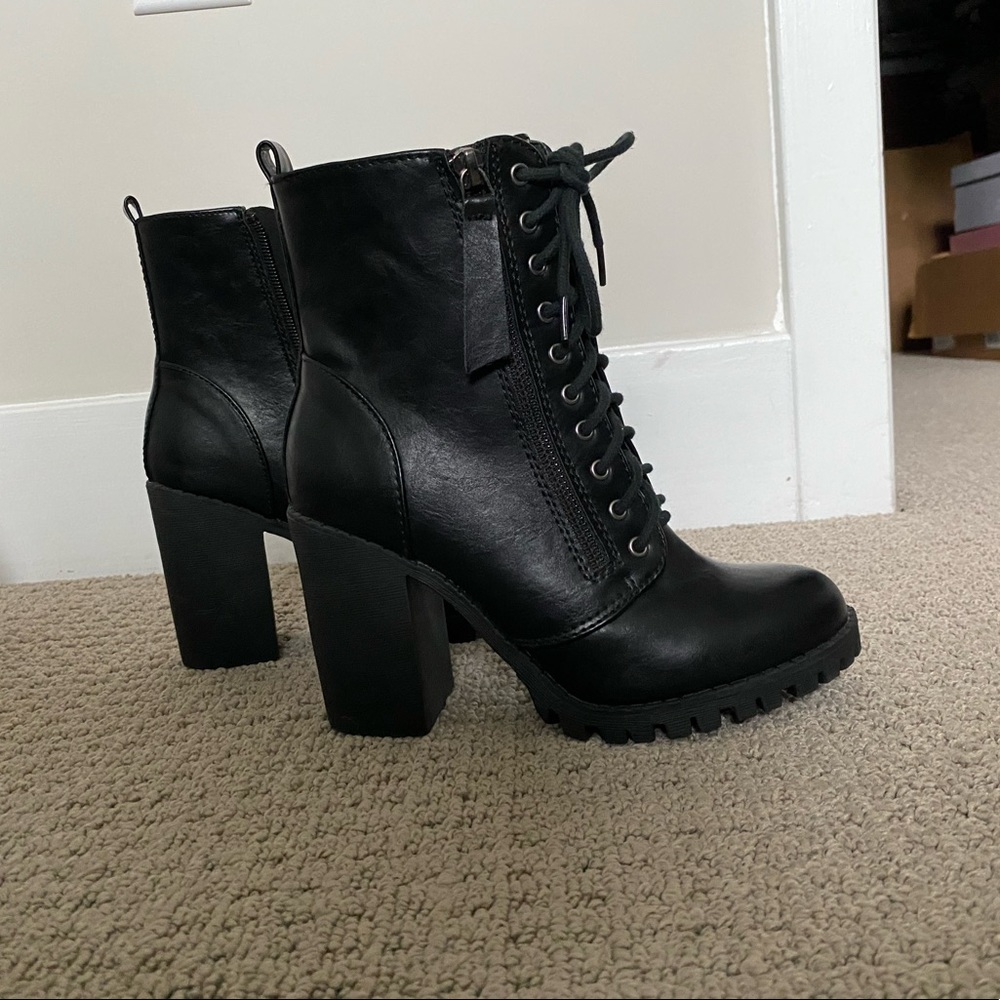 Women’s heeled combat boots by Soda